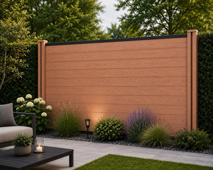 Composite Fencing Panel Set Dark Teak single panel view installed in garden with hydrangea planting and ambient lighting